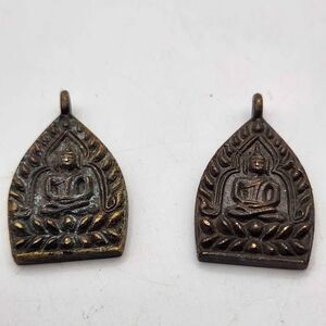 Vintage Thai Phra Chao Sua Buddha Amulets - 2 Piece Lot